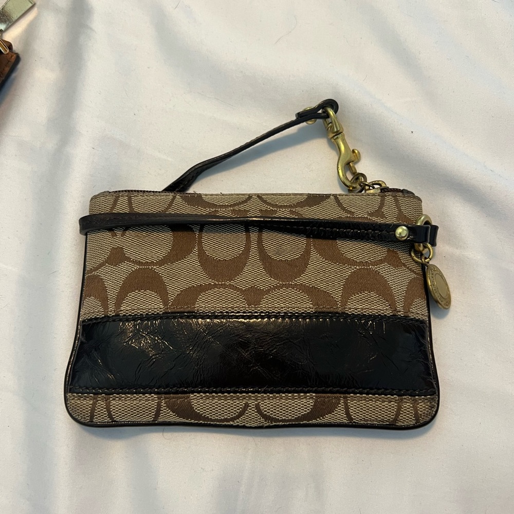 Coach Wristlet. Brown with logo